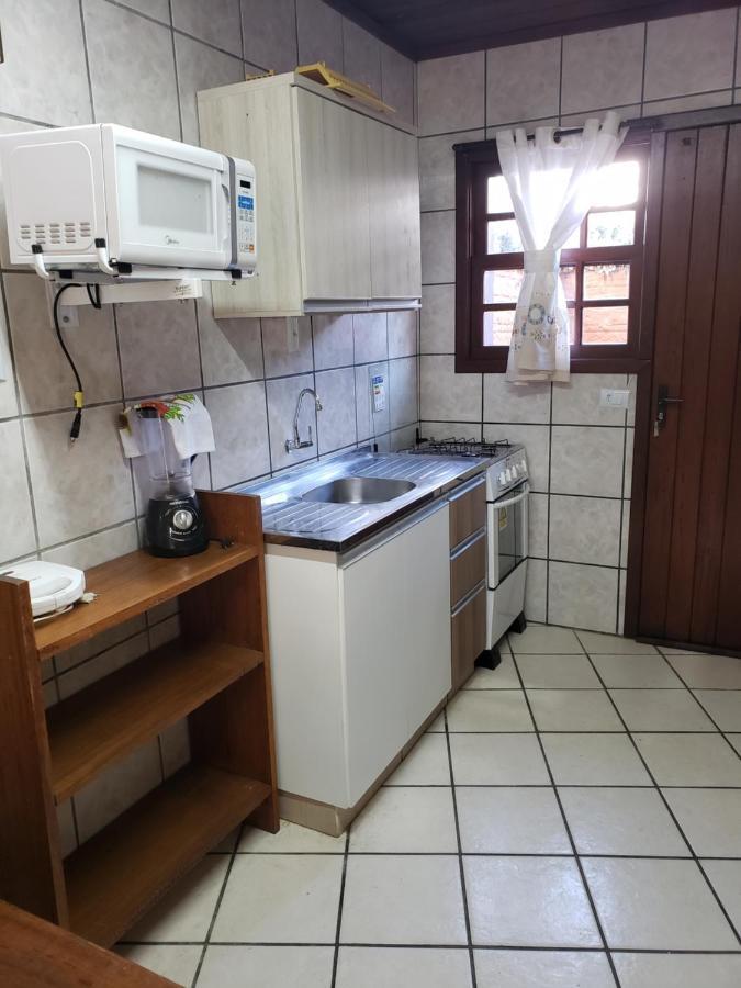 Residencial Costumes Brasileiras Hotel Бомбиняс Екстериор снимка